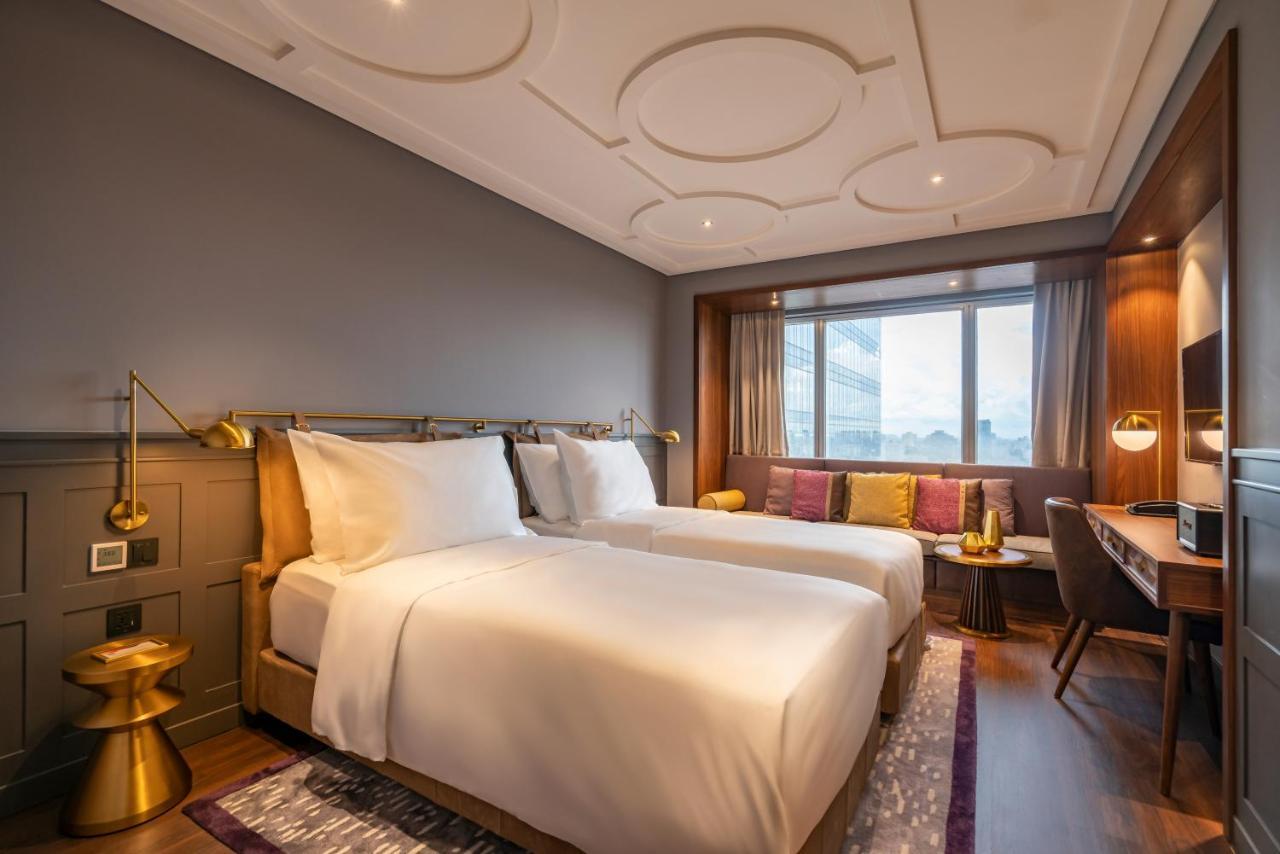 胡志明市 Fusion Original Saigon Centre酒店 外观 照片 Deluxe Room