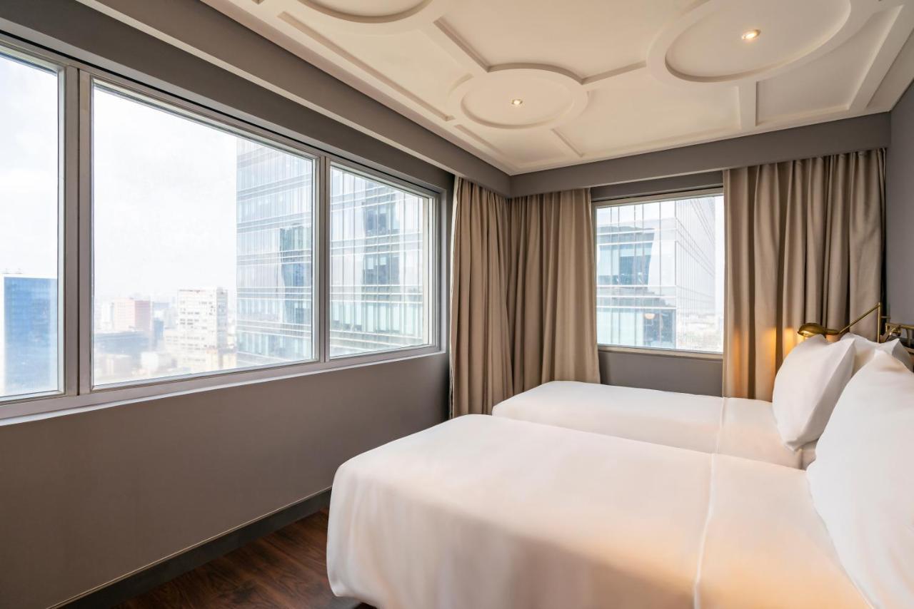 胡志明市 Fusion Original Saigon Centre酒店 外观 照片 Deluxe Room